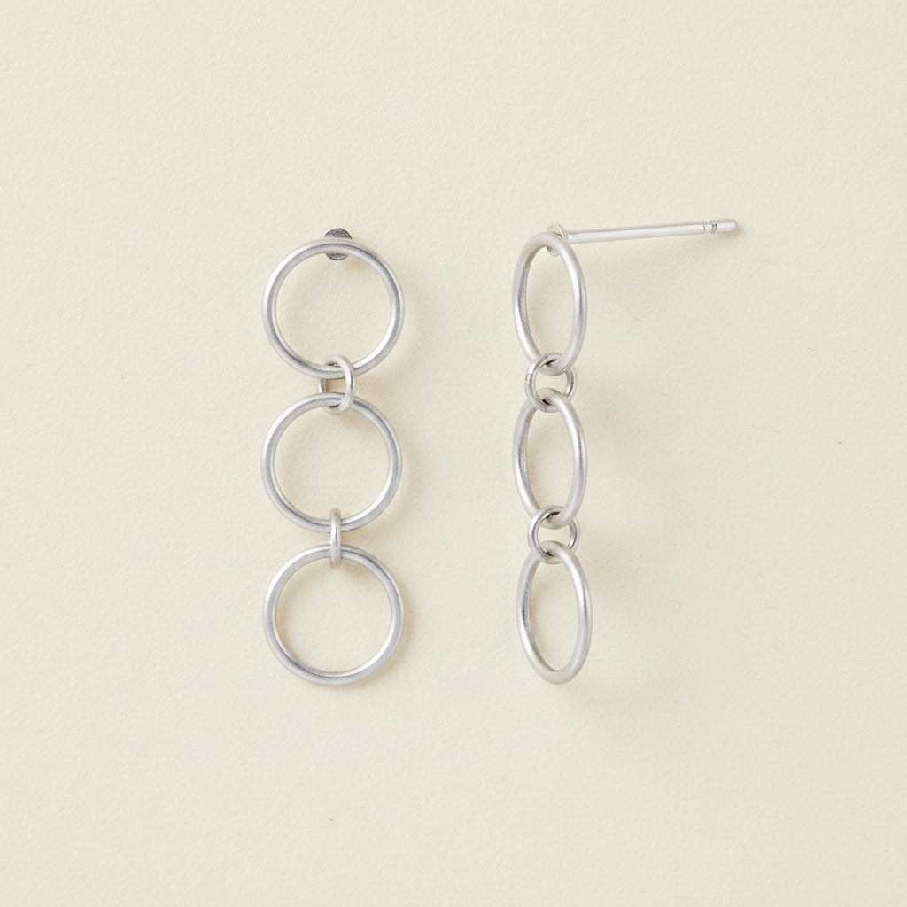 Triple loop hoop post earrings, three linked round hoops in silver-tone metal