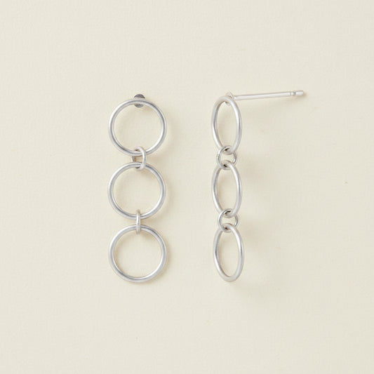 Triple loop hoop post earrings, three linked round hoops in silver-tone metal