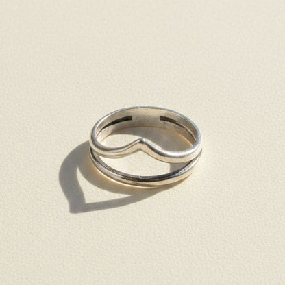 Silver-tone stacked rings with curved cutout center