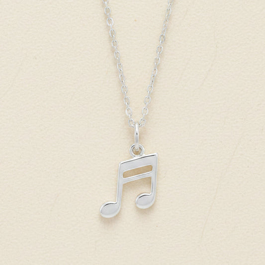 Silver-tone musical note pendant necklace with openwork note charm on a chain