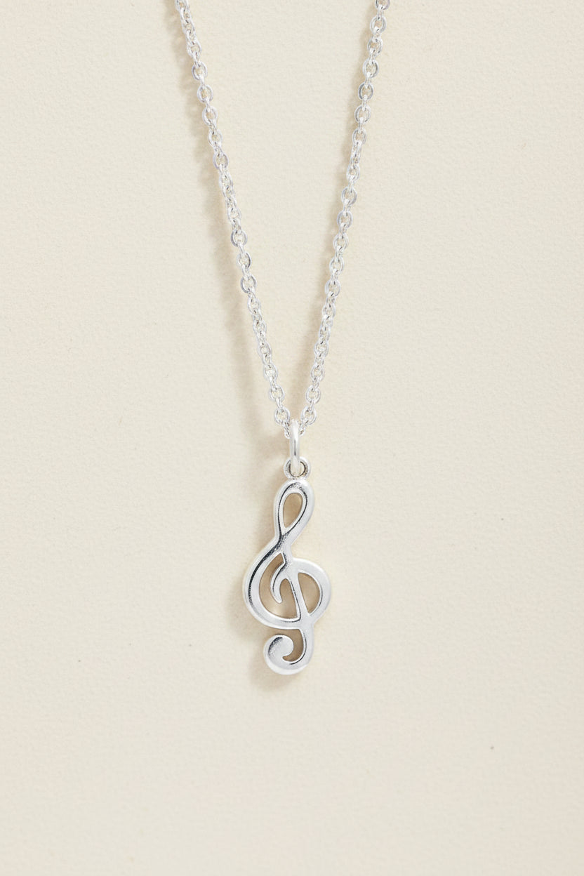 Silver treble clef pendant necklace with polished treble clef charm
