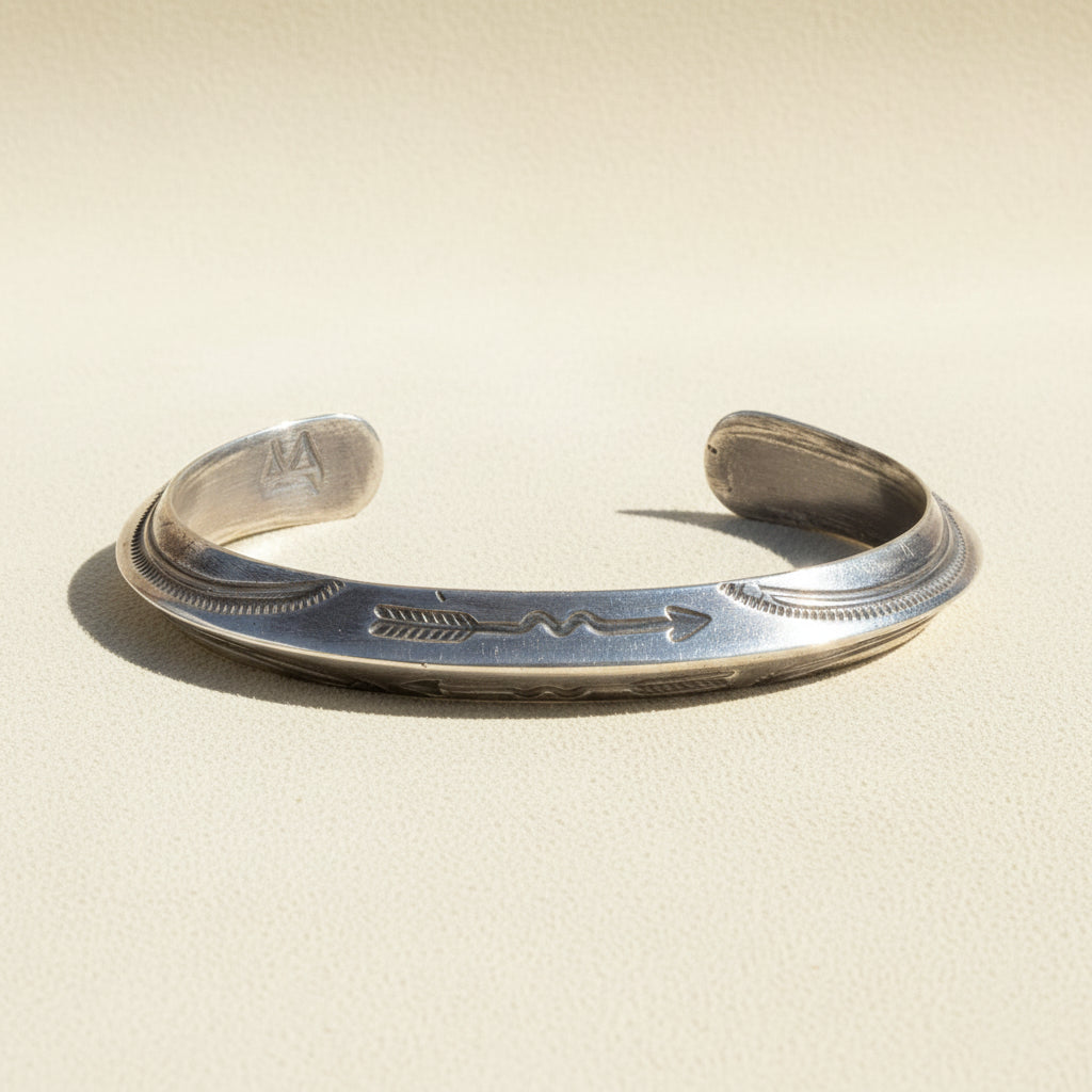 Silver arrow engraved cuff bracelet with open ends