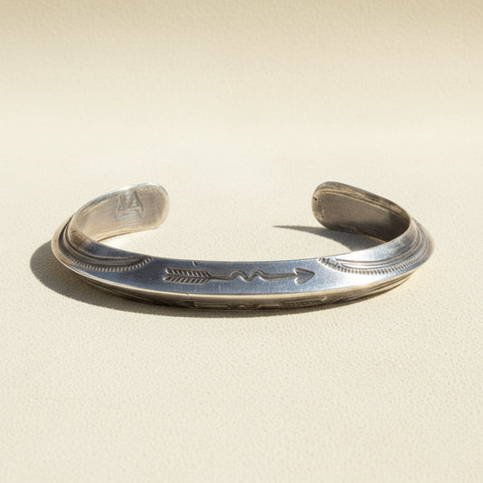 Silver arrow engraved cuff bracelet with open ends