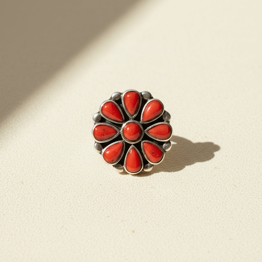 Coral flower statement ring with silver-tone scalloped setting and red teardrop stones