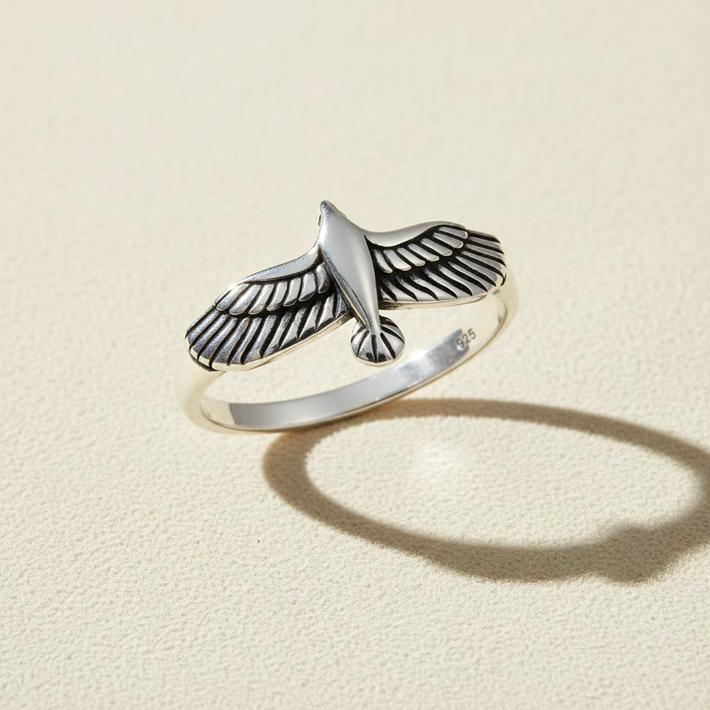 Silver eagle motif ring with raised wings, size 10