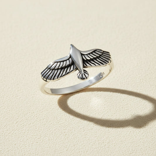 Silver eagle motif ring with raised wings, size 10