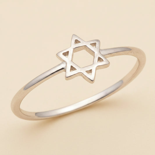Silver-tone ring with small Star of David charm on open band