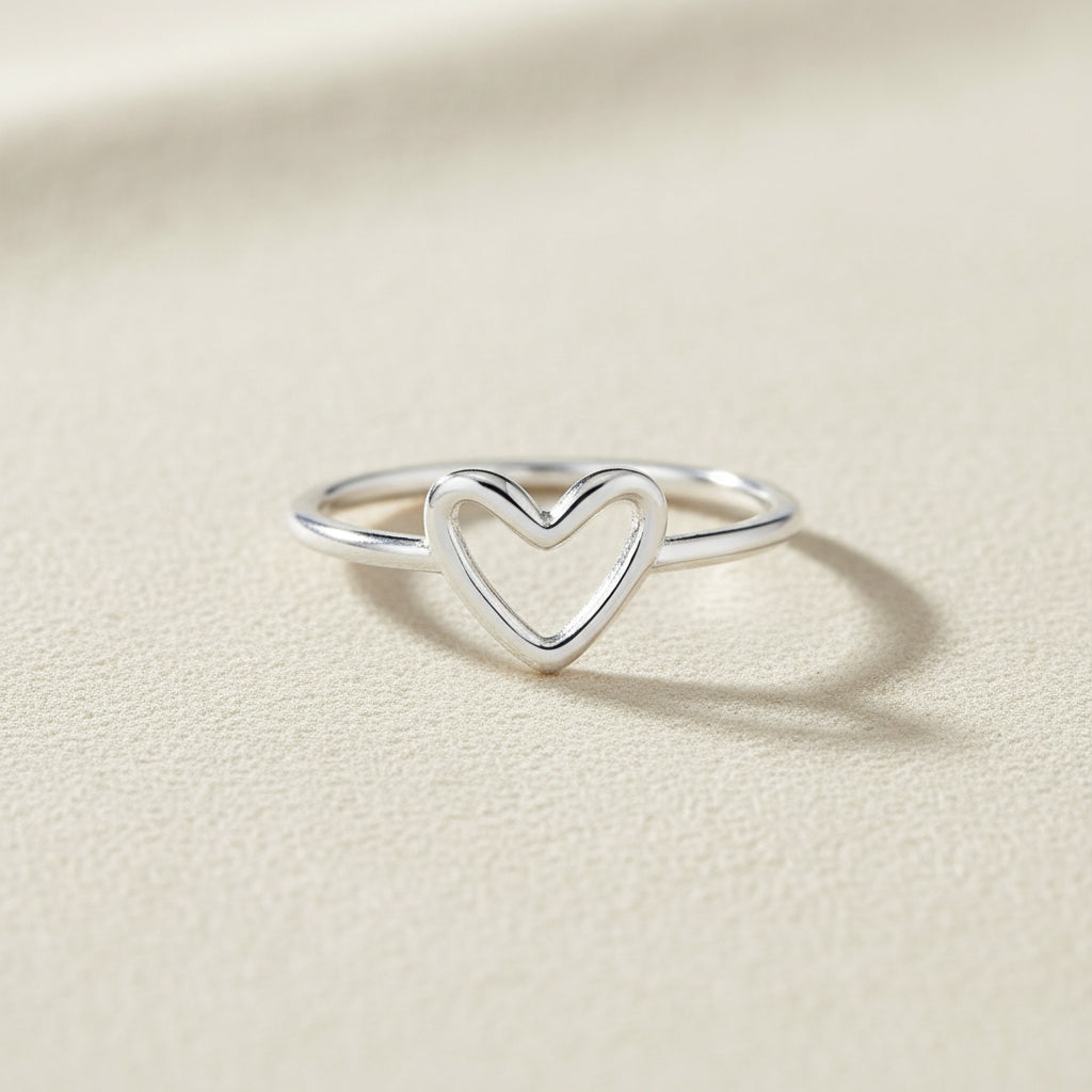 Silver-tone open-heart ring with raised heart front