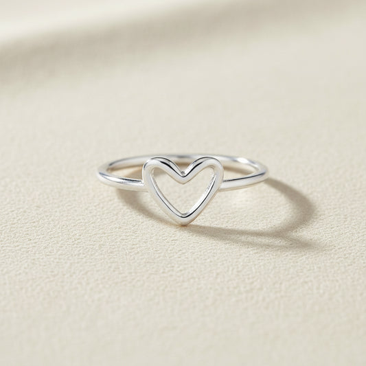 Silver-tone open-heart ring with raised heart front
