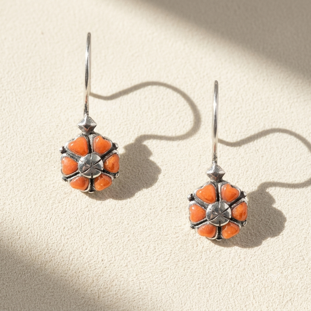 Silver-tone squash blossom earrings with orange flower petals and hook backs