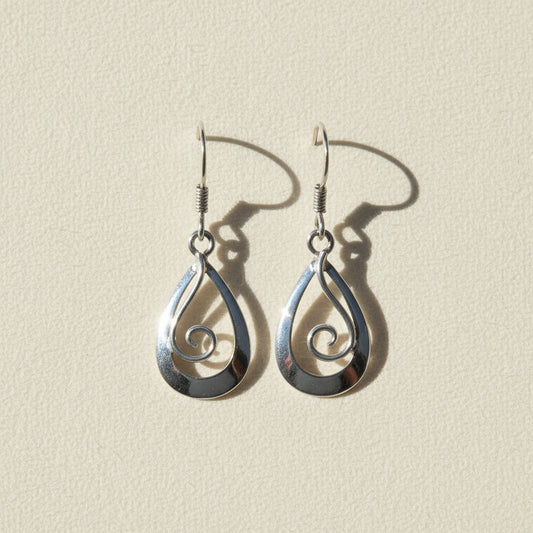 Silver teardrop earrings with spiral swirl detail and fishhook backs