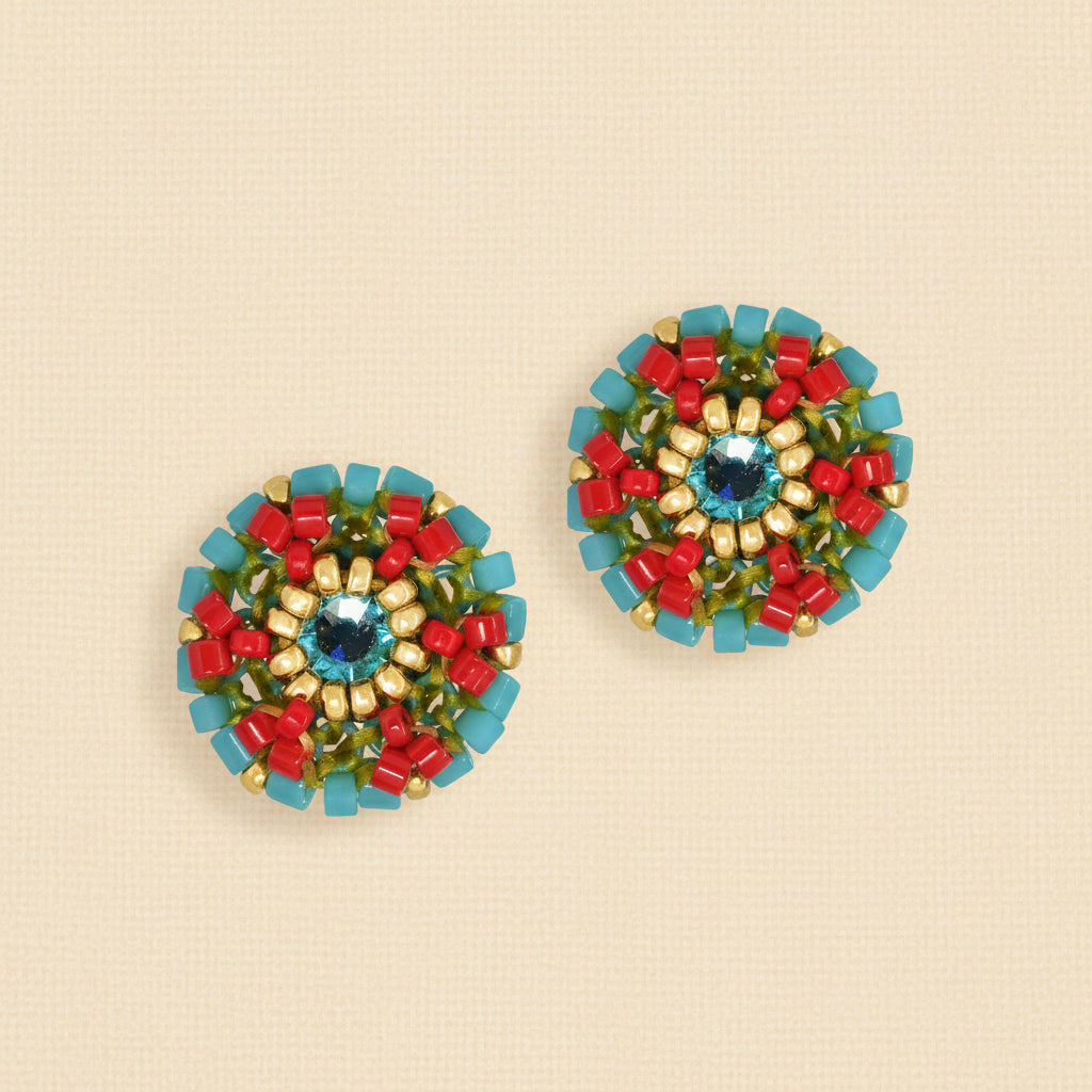 Colorful beaded earrings on a white background