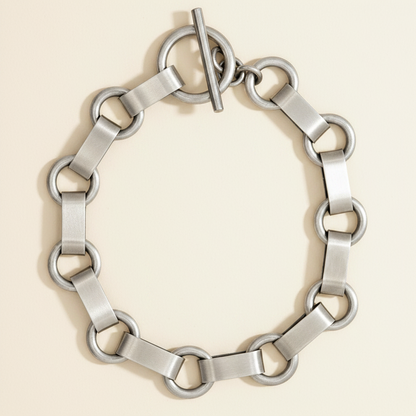 Silver circle link bracelet with rectangular bars and round rings