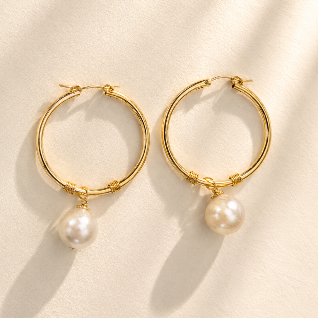 Gold-tone hoop earrings with freshwater pearl drop pendants