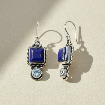 Pair of blue gemstone drop earrings: square stone with oval crystal, silver-tone