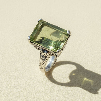 Green amethyst statement ring with square-cut stone and silver filigree setting