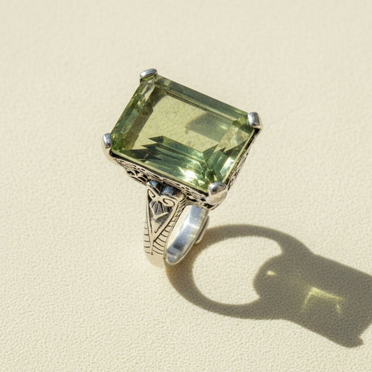 Green amethyst statement ring with square-cut stone and silver filigree setting