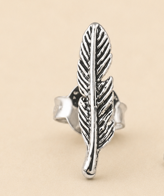 Silver-tone layered feather stud earring with engraved leaf vein details