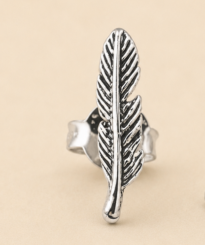 Silver-tone layered feather stud earring with engraved leaf vein details