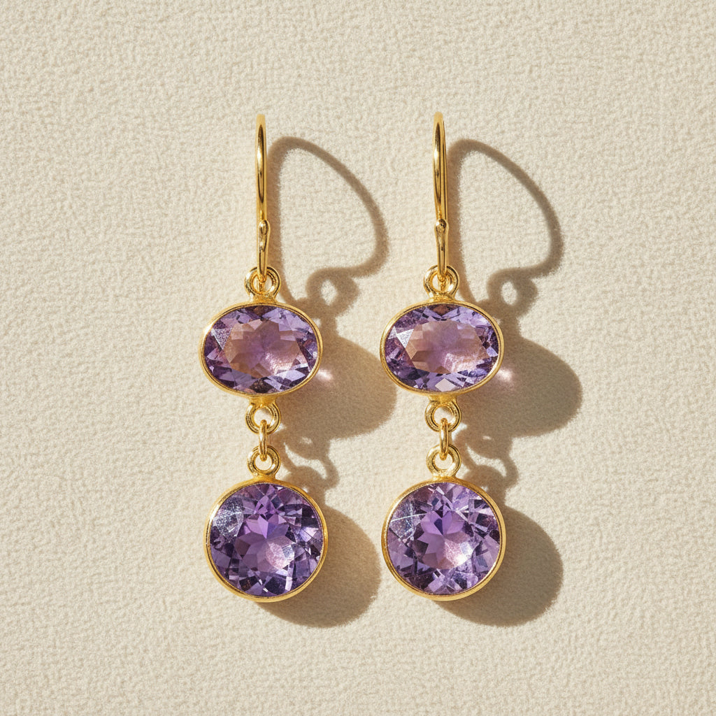Gold-tone bezel double-drop earrings with two round purple amethyst stones