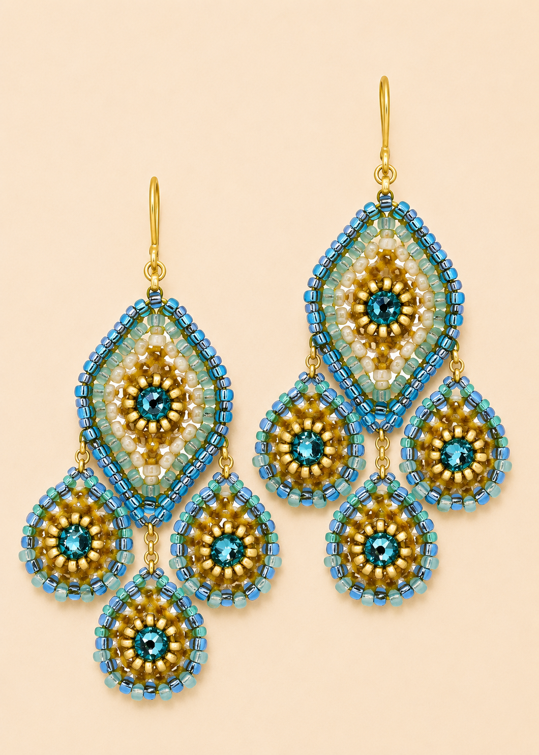 Blue and gold beaded chandelier earrings with teardrop drops and gold hook backs