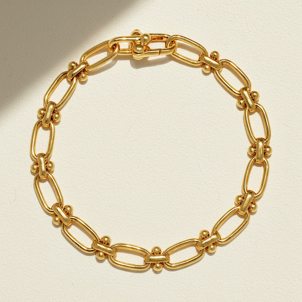 Gold-tone oval link statement bracelet with toggle clasp