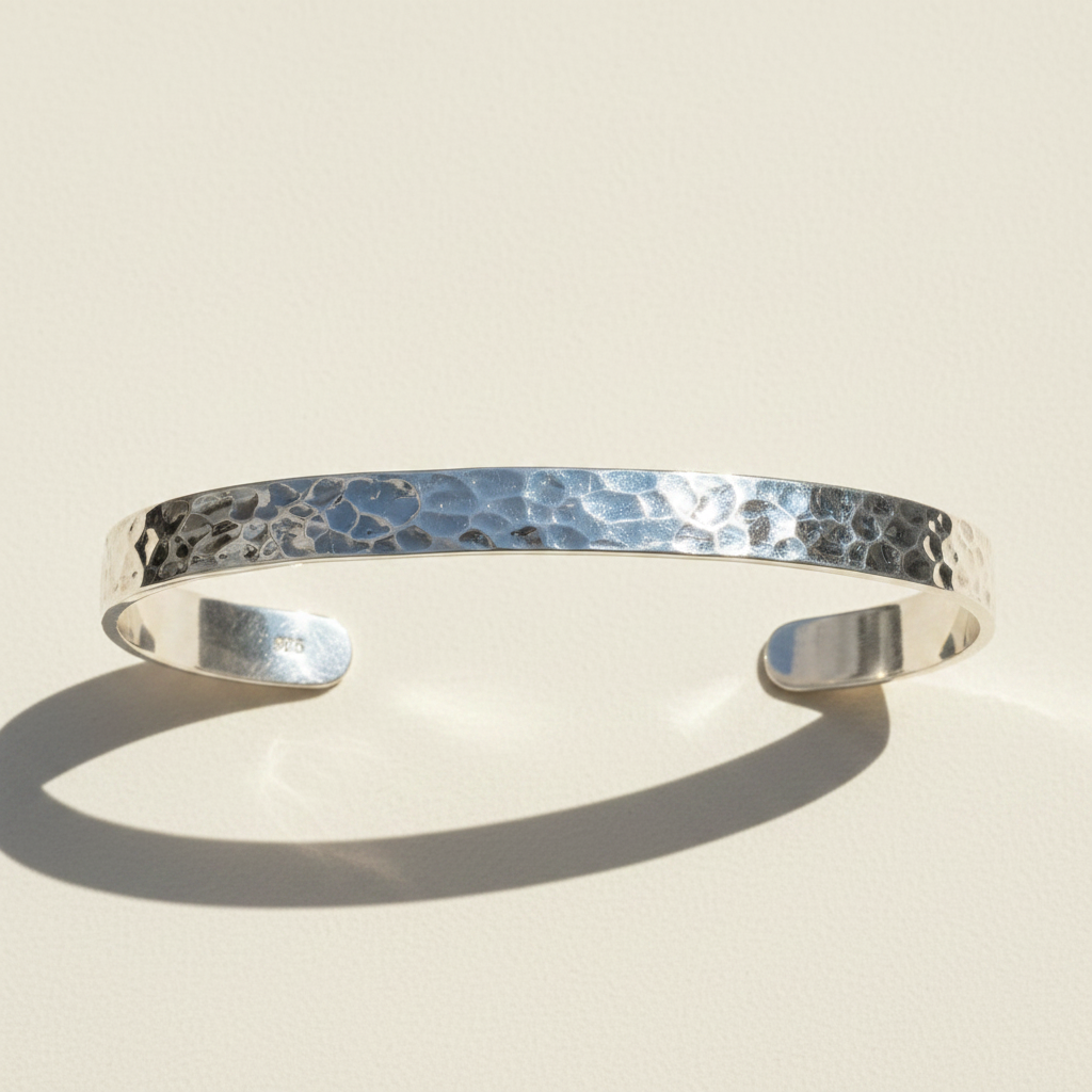Silver hammered domed cuff bracelet with textured band