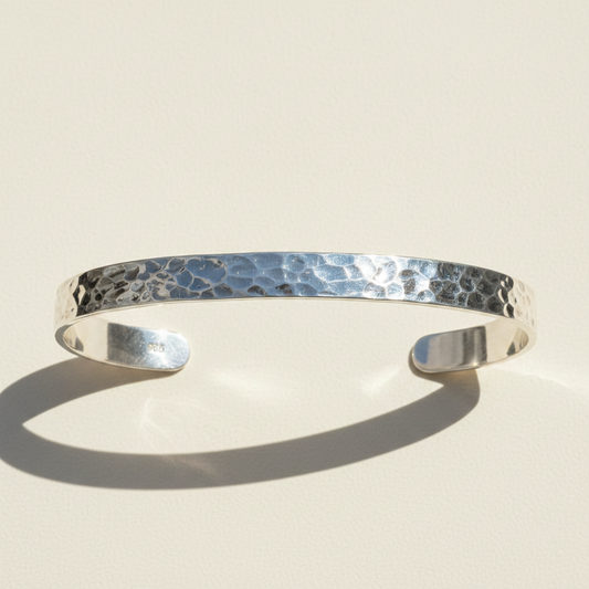Silver hammered domed cuff bracelet with textured band