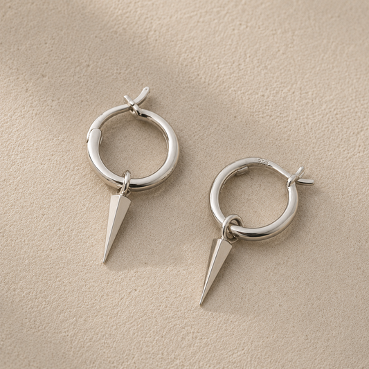 Silver spike hoop earrings with pointed drop charm