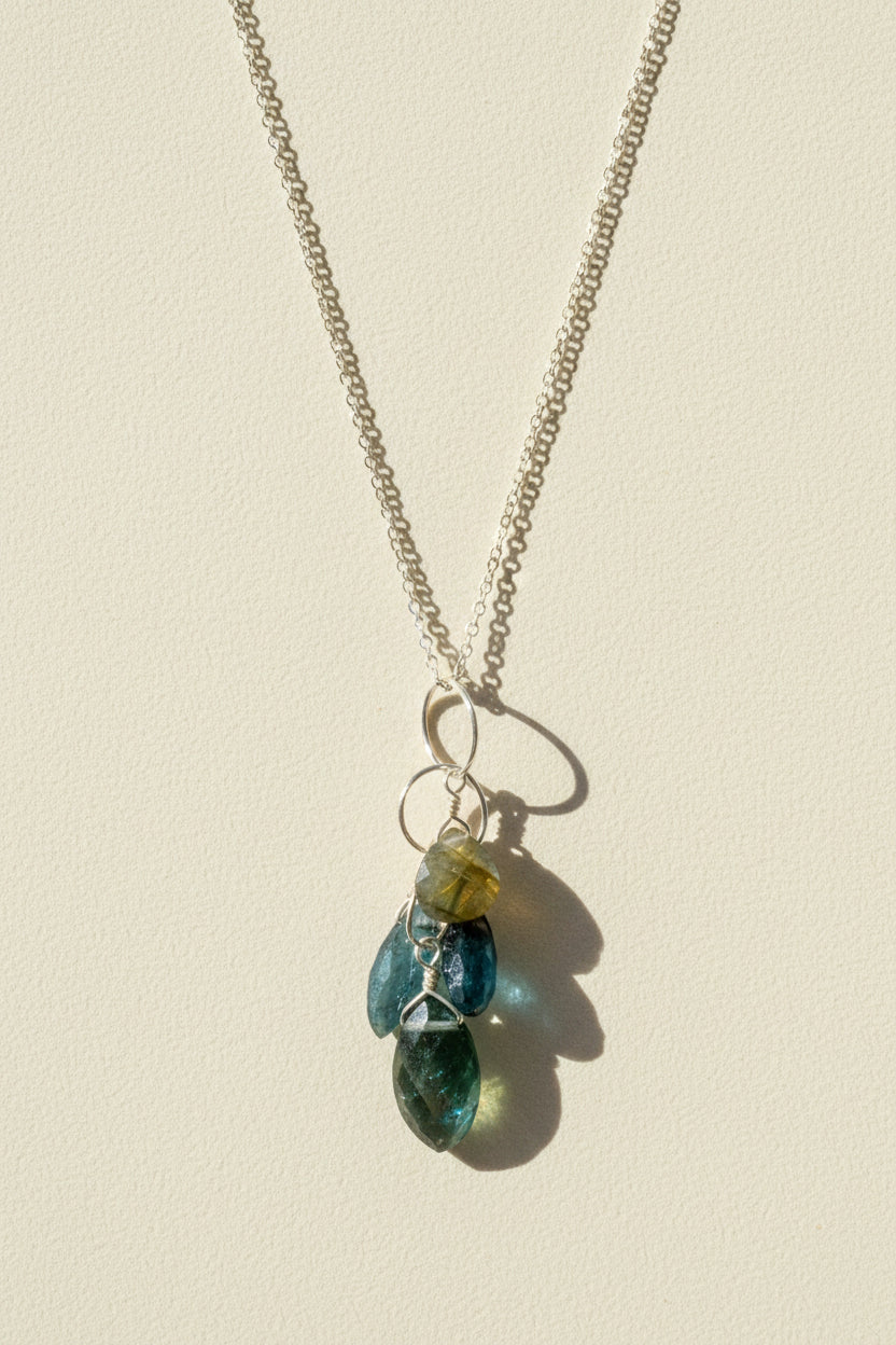 Silver chain necklace with teardrop green-blue gemstone cluster pendant
