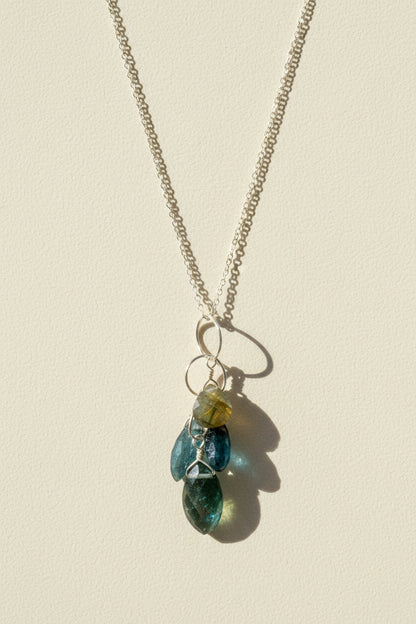 Silver chain necklace with teardrop green-blue gemstone cluster pendant