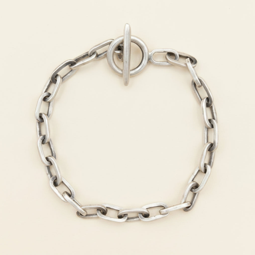 Silver oval link bracelet with box clasp and oval connector ring