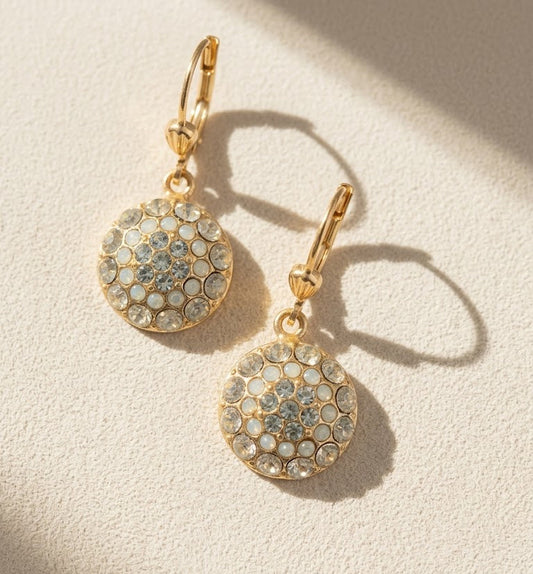 Gold-tone round rhinestone drop earrings with hinged hoops and coin pendants