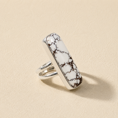 Oblong wild horse jasper ring, white with dark brown webbing, silver prong setting