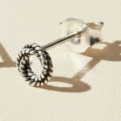 Single twisted rope knot loop stud earring with open braid texture and butterfly back