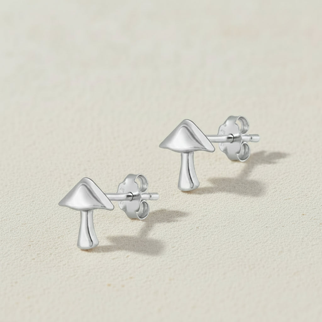 Silver mushroom-shaped stud earrings with butterfly backings