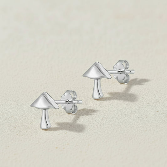 Silver mushroom-shaped stud earrings with butterfly backings