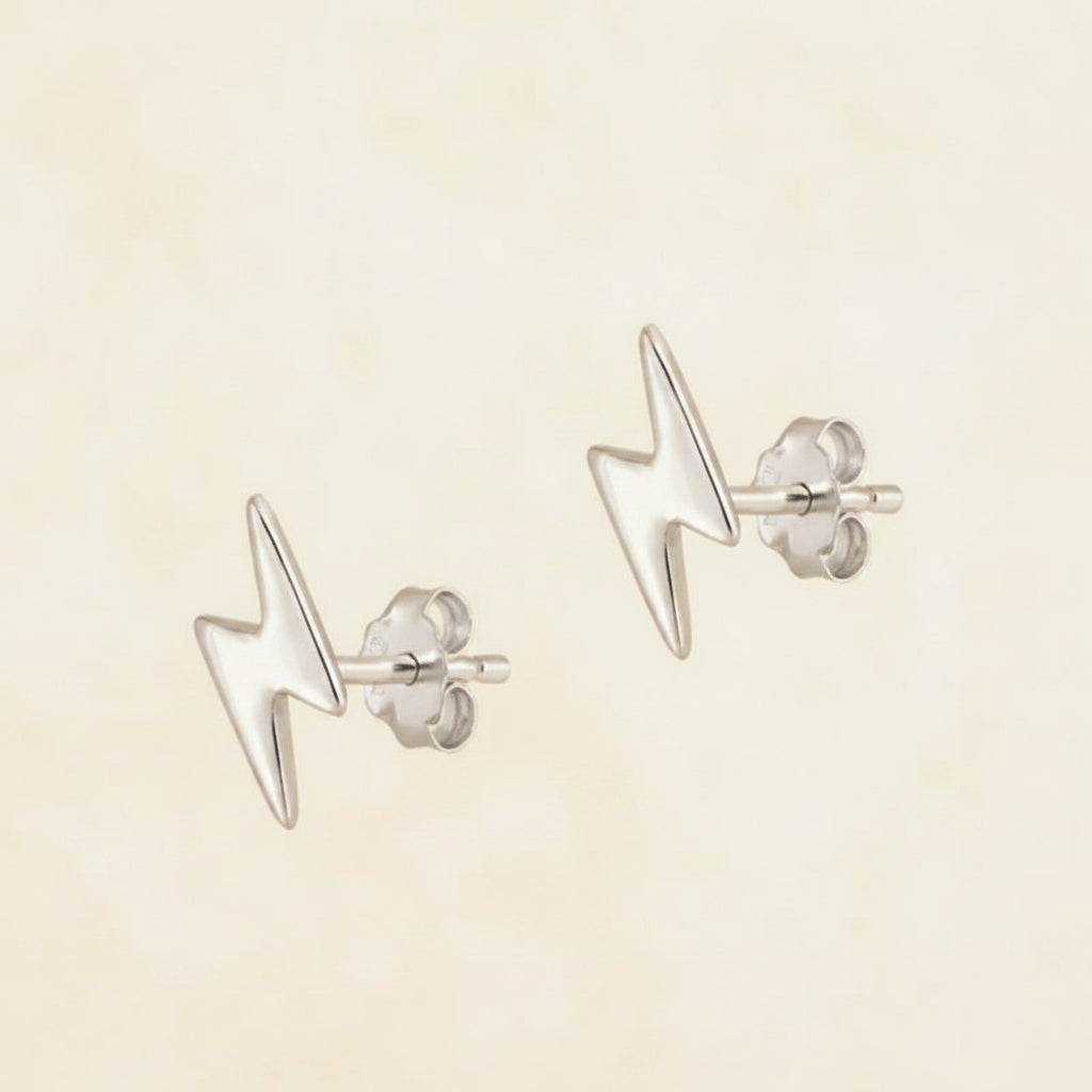 Lightning bolt stud earrings in silver-tone metal with butterfly backs