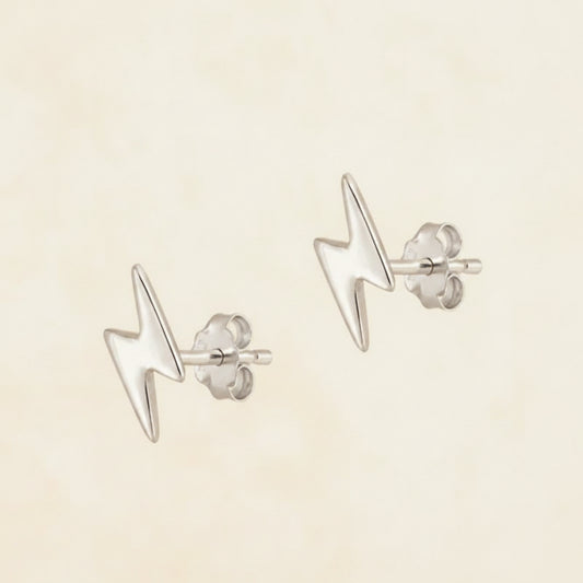 Lightning bolt stud earrings in silver-tone metal with butterfly backs