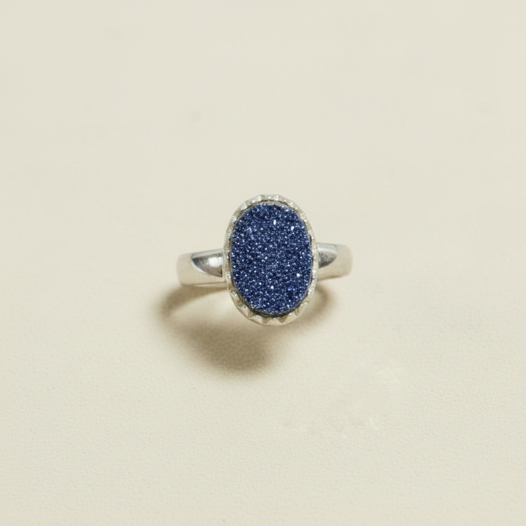 Oval druzy ring with deep blue glitter stone and silver band