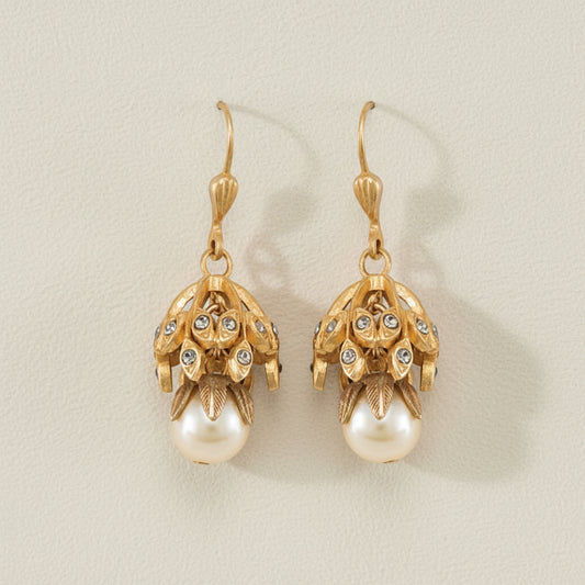 Gold-tone floral drop earrings with dangling faux pearl and textured charm caps