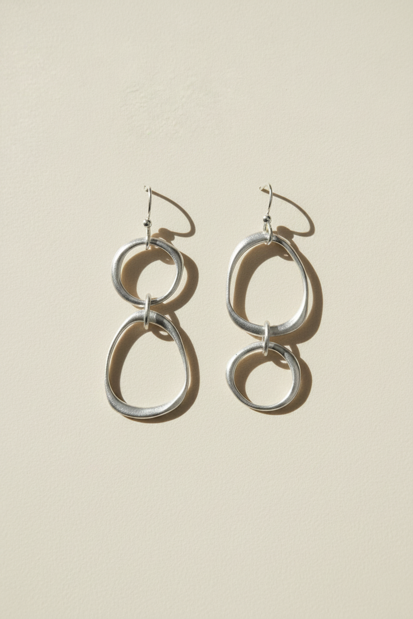 Silver double-circle drop earrings with hook backs
