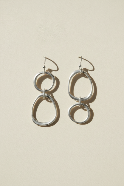 Silver double-circle drop earrings with hook backs