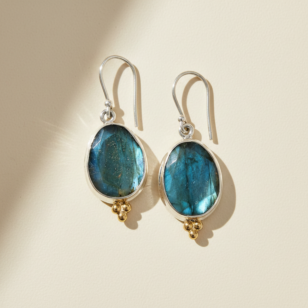 Labradorite oval drop earrings with teal-blue gemstone and gold bead dangles