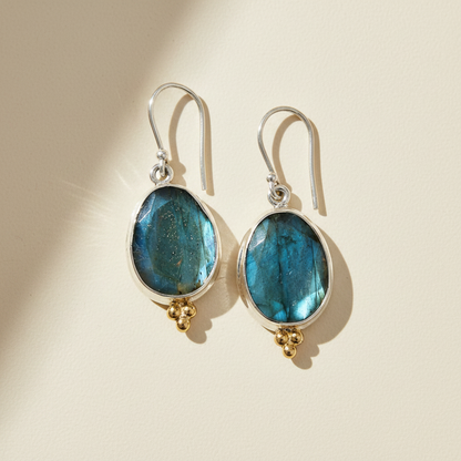 Labradorite oval drop earrings with teal-blue gemstone and gold bead dangles