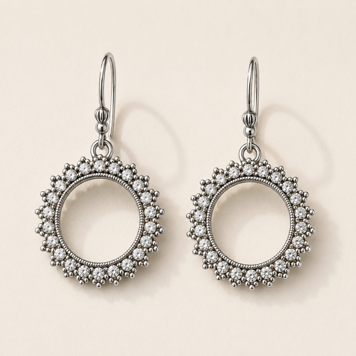 Silver-tone crystal drop earrings with round halo and dangling hoop closure
