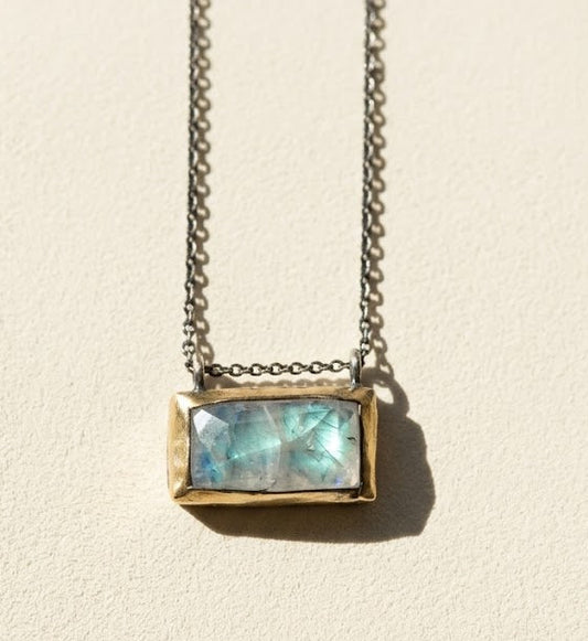 Rectangle pendant necklace with blue-green gem set in gold-tone bezel and chain