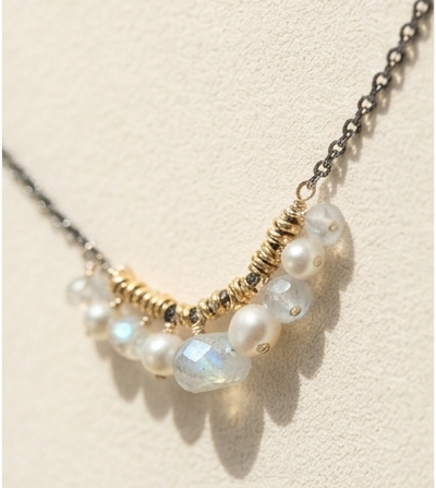 Gold-tone cloud cluster necklace with pearl and iridescent bead drops on chain