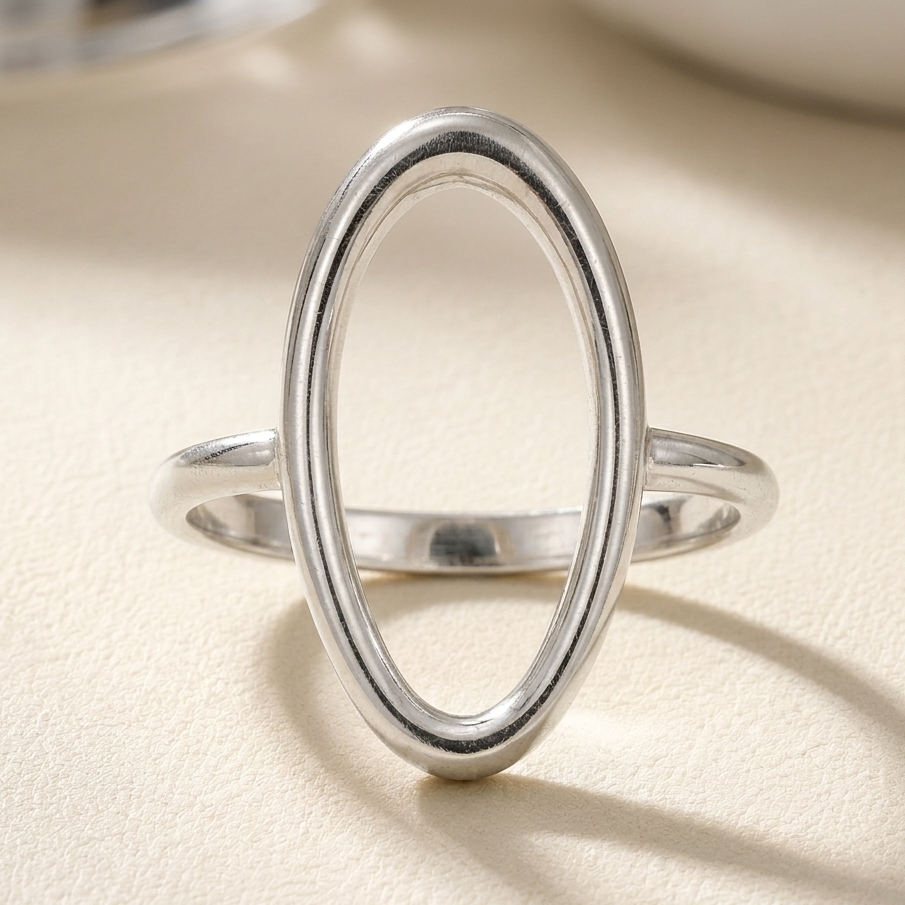 Silver oval organic ring with open band, smooth polished finish
