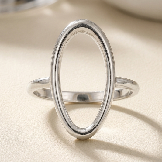 Silver oval organic ring with open band, smooth polished finish